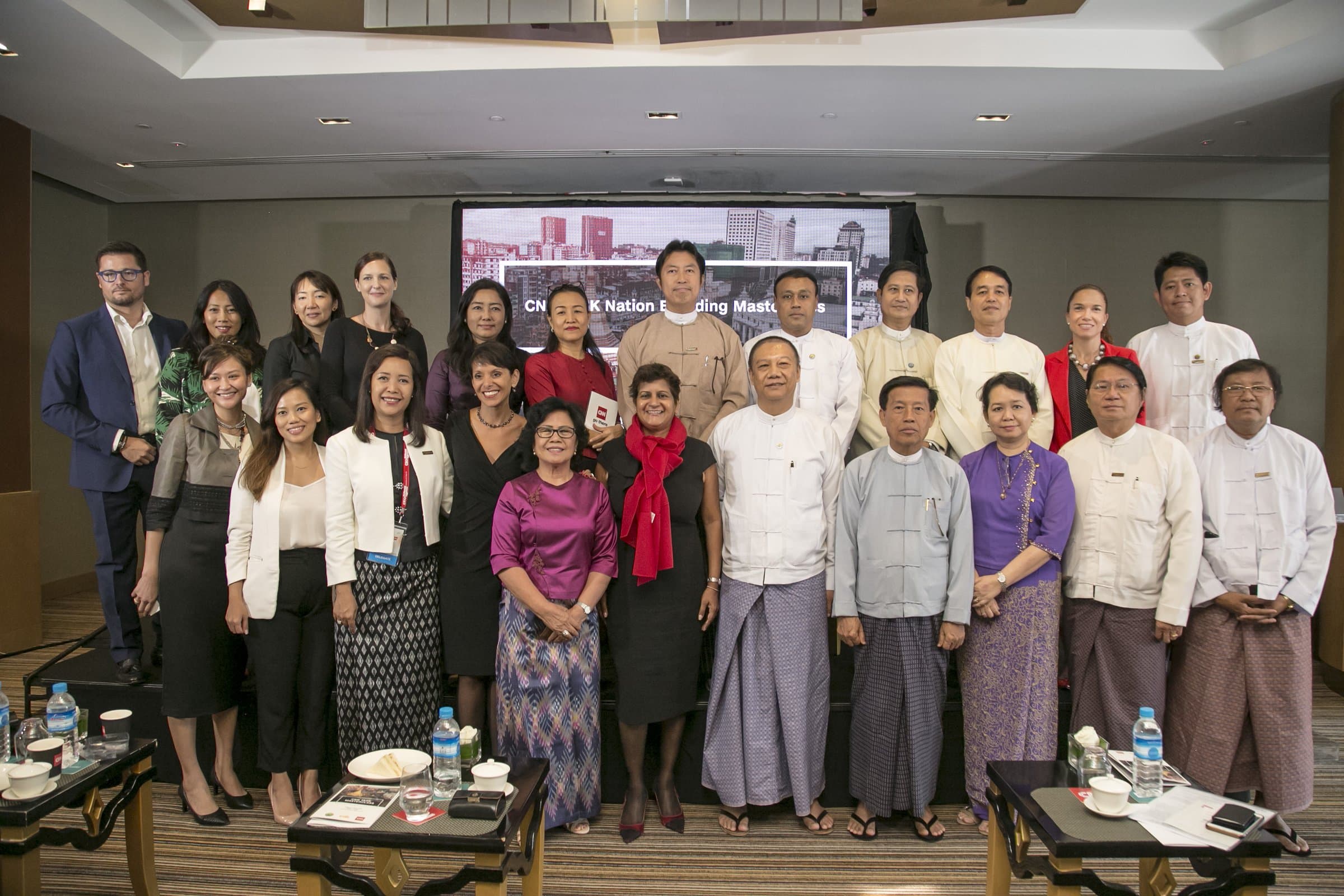 Speakers and delegation at the masterclass backdrop