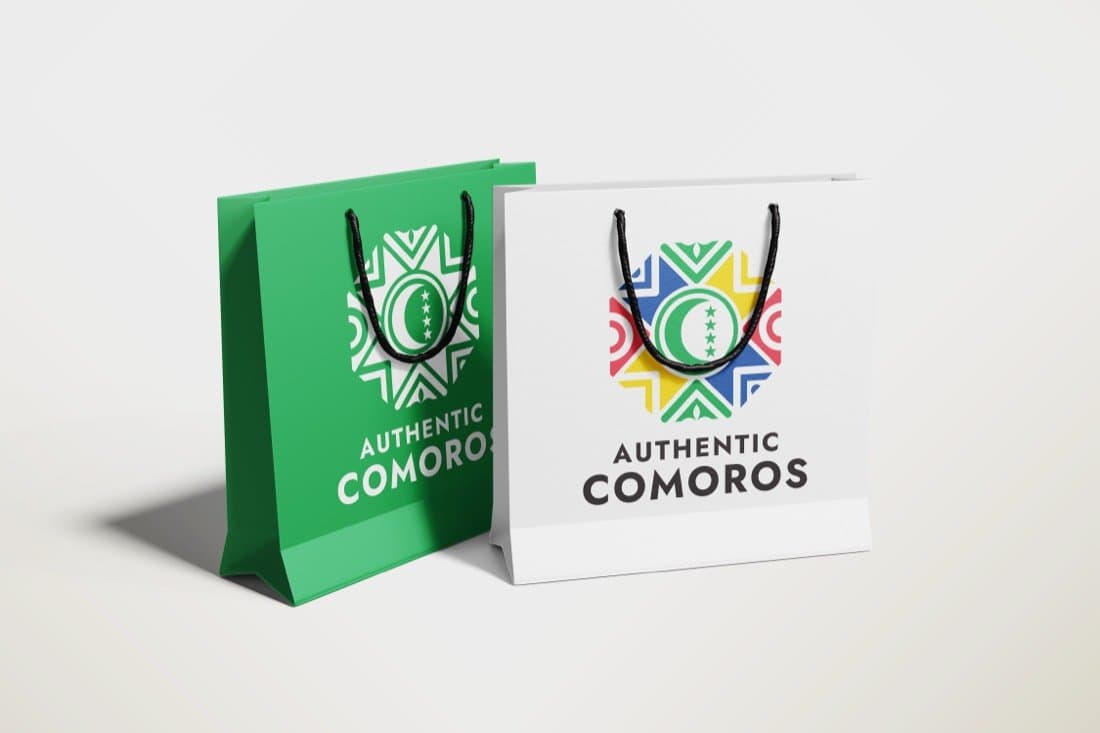 Branded carrier bags in the label's green and white