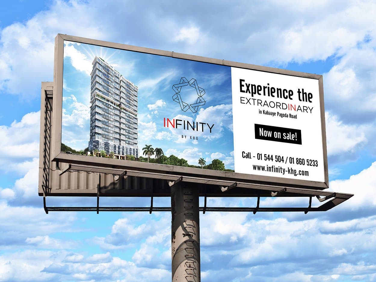Infinity by KHG — 'Experience the Extraordinary' billboard on Kabaaye Pagoda Road