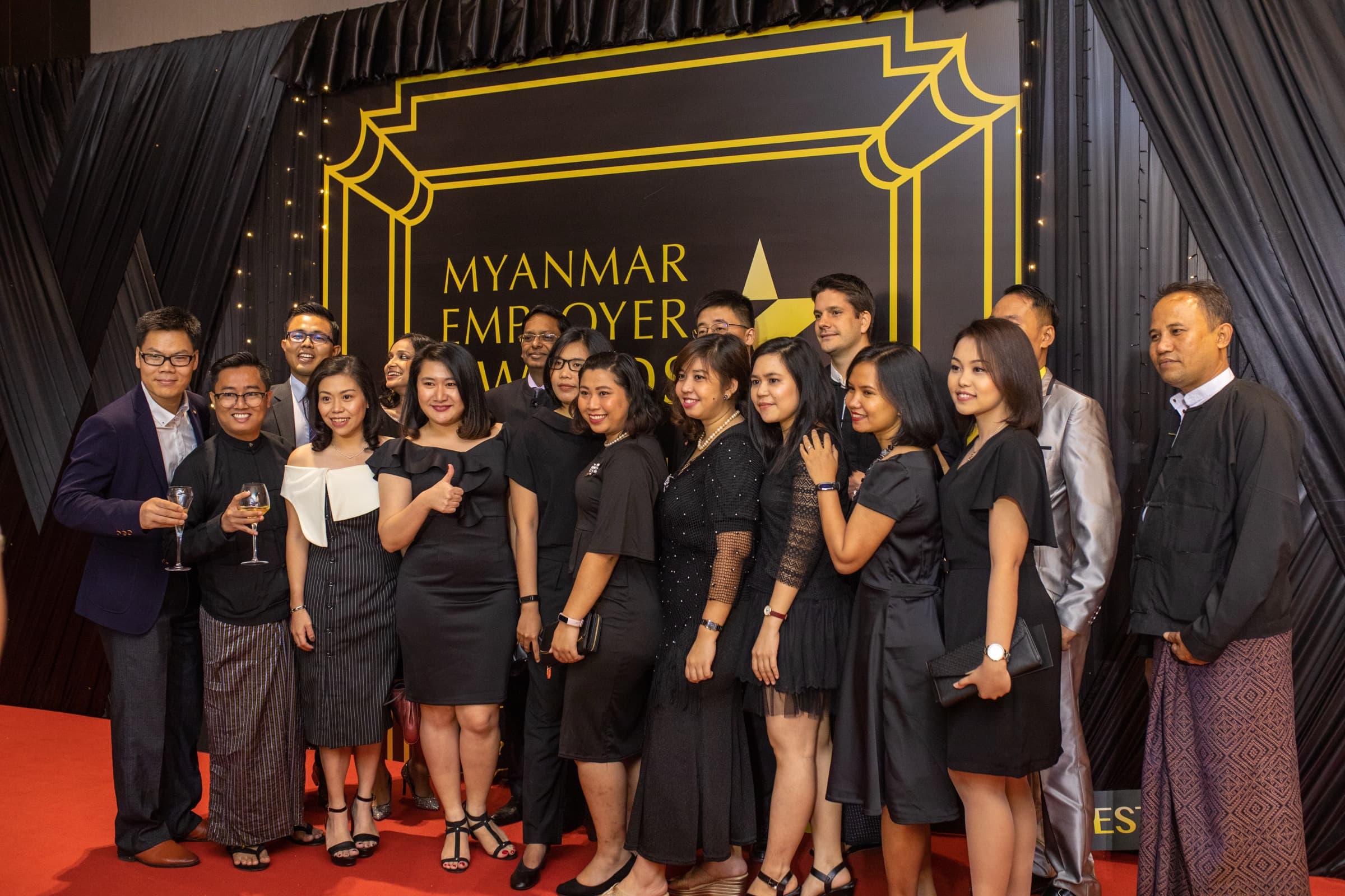Myanmar Employer Awards 2017 — winners with the trophy