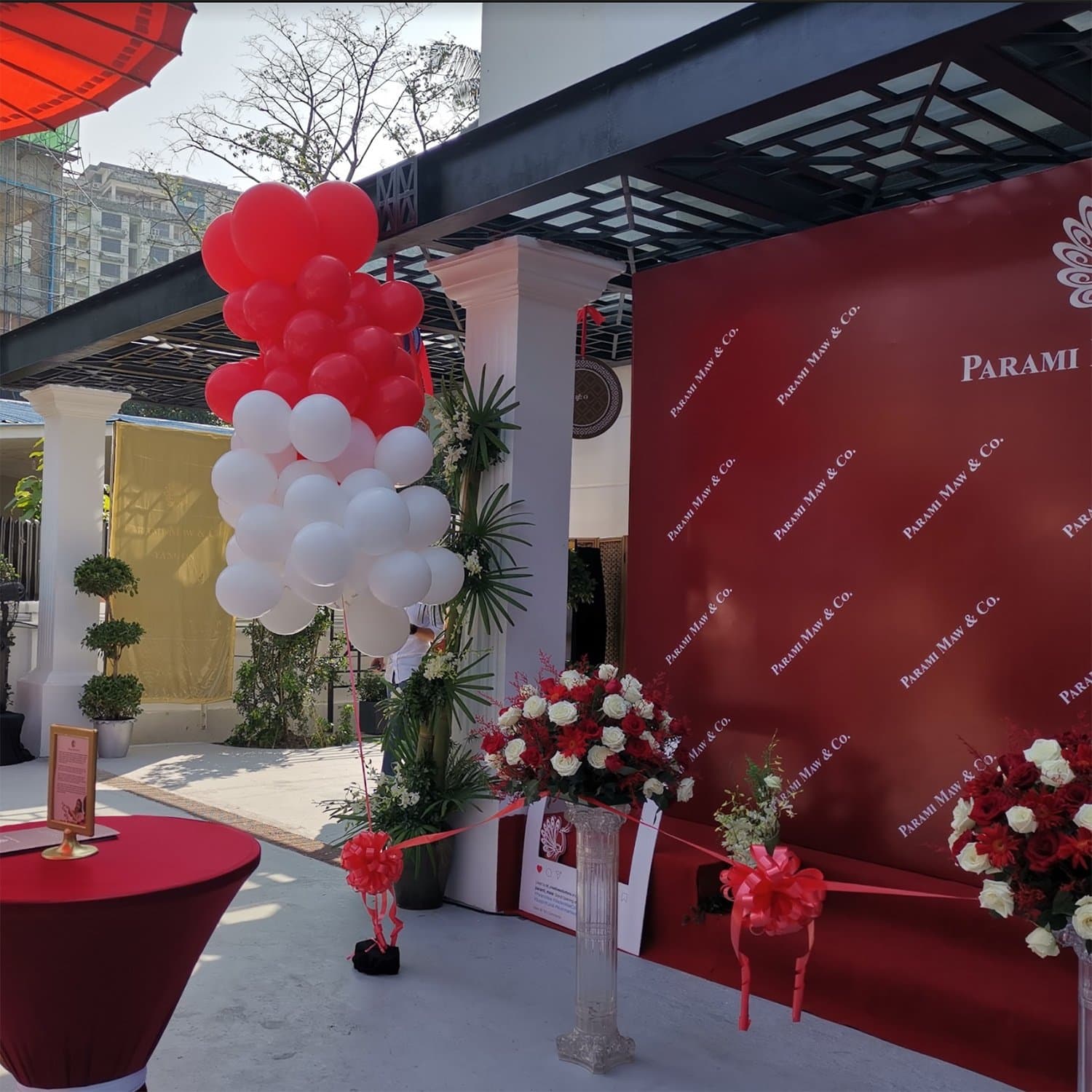 Ribbon ceremony against the step-and-repeat backdrop