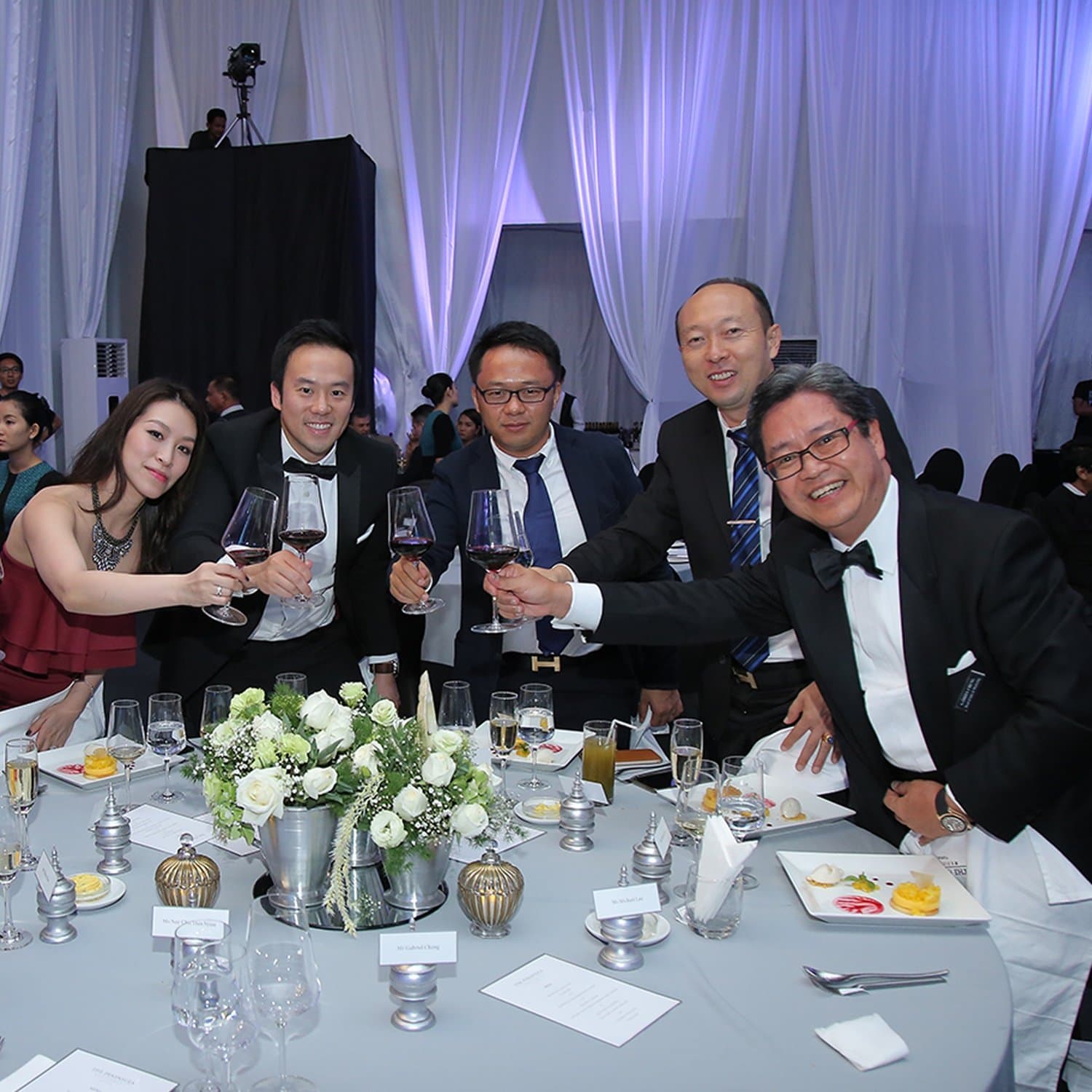 Guests raising a toast at the gala dinner