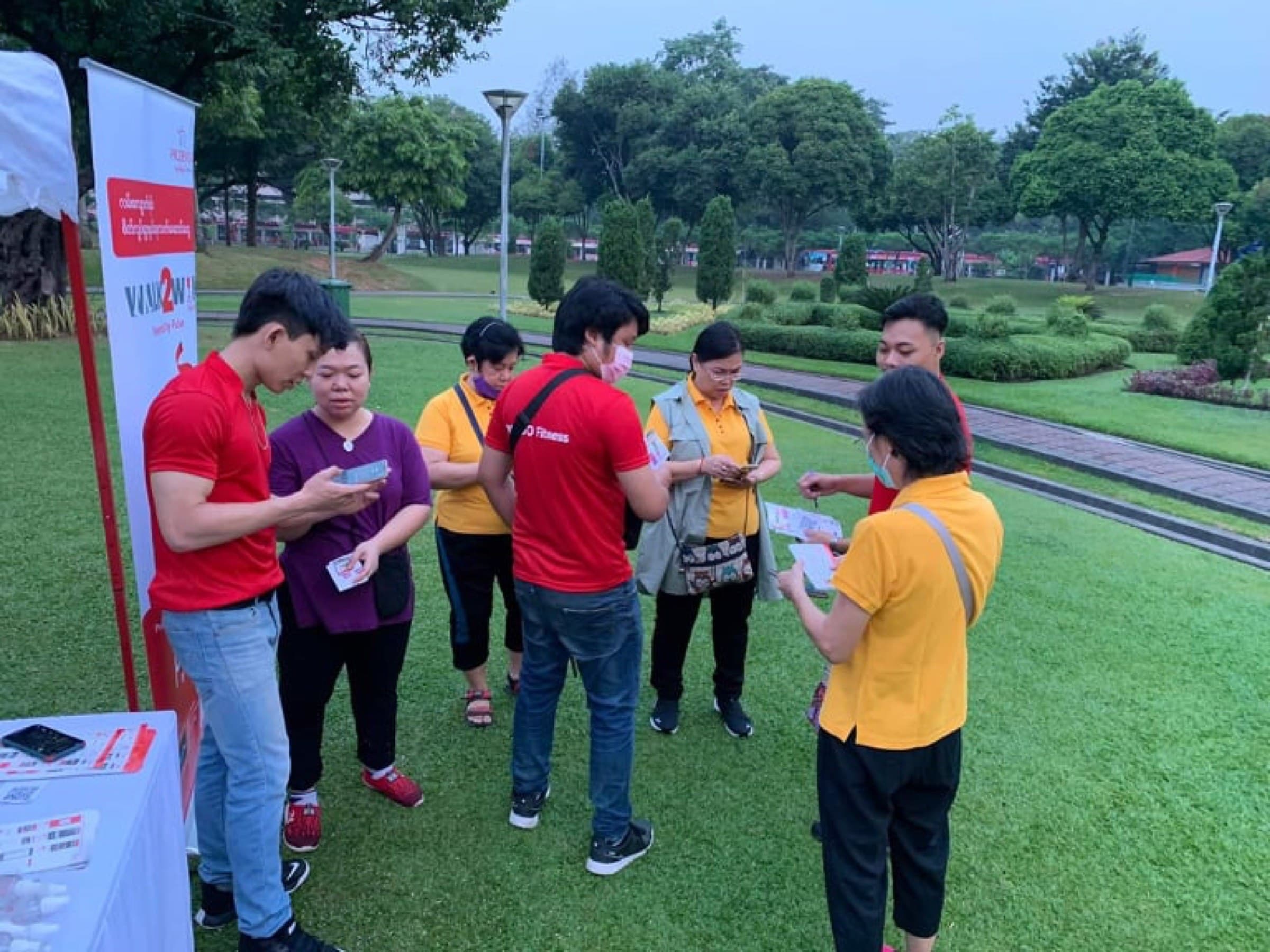 Morning walkers registering at People's Park